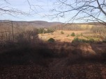 Hilltop Lodge Atop Motocross Track in January